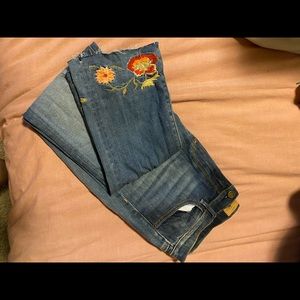 Driftwood jeans with flower embroidery at hem. Never been worn